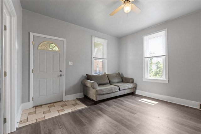 150 Frank St, Whitaker, PA 15120 - foyer entrance with light wood-style flooring and a ceiling fan