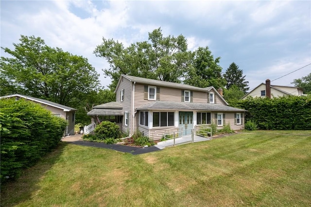 1539 Dime Rd, Parks Twp, PA 15690 - view of front of house featuring a front yard, a sunroom, and a chimney