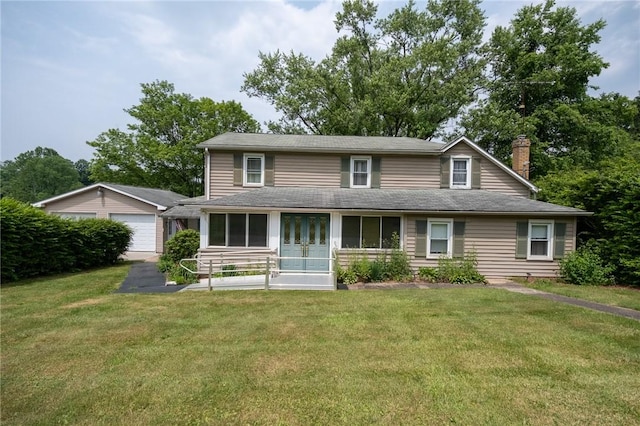 1539 Dime Rd, Parks Twp, PA 15690 - view of front facade featuring a detached garage, a chimney, a front yard, and roof with shingles