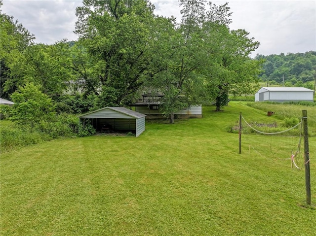 1539 Dime Rd, Parks Twp, PA 15690 - view of grassy yard featuring an outdoor structure, a pole building, and a detached carport
