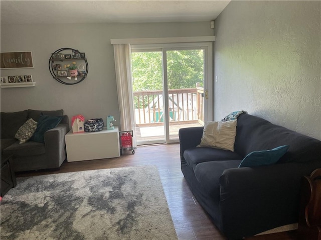 10240 Roseway Blvd, North Huntingdon, PA 15642 - living room with a textured wall and wood finished floors