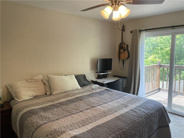10240 Roseway Blvd, North Huntingdon, PA 15642 - bedroom featuring access to exterior, carpet floors, a textured wall, and ceiling fan
