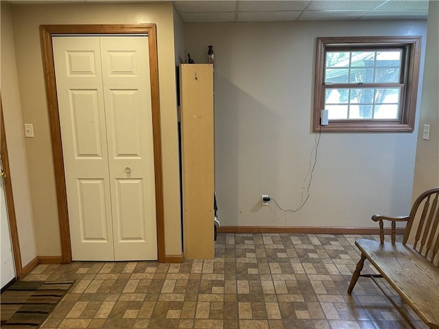10240 Roseway Blvd, North Huntingdon, PA 15642 - unfurnished room featuring a drop ceiling and brick patterned floors