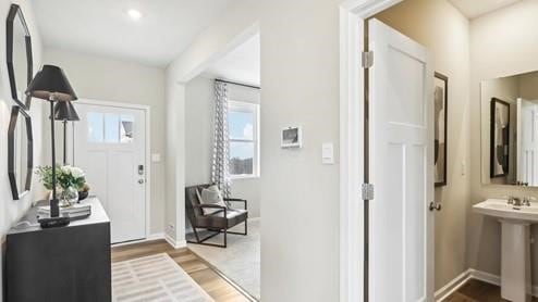346 Leslie Farms Dr, Connoquenessing Boro, PA 16033 - foyer entrance with wood finished floors