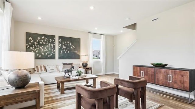 346 Leslie Farms Dr, Connoquenessing Boro, PA 16033 - living room with light wood-type flooring and recessed lighting