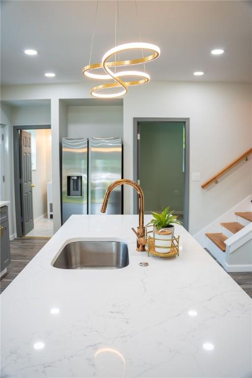 428 Donna, Garfield, PA 15224 - kitchen featuring stainless steel refrigerator with ice dispenser, pendant lighting, recessed lighting, and light stone countertops