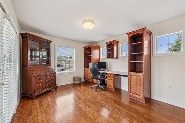 1041 Ashfield Way, Salem Twp Wml, PA 15601 - home office featuring dark wood-type flooring and built in study area