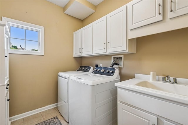 1041 Ashfield Way, Salem Twp Wml, PA 15601 - laundry room featuring cabinet space, separate washer and dryer, and light tile patterned floors