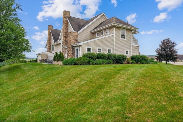 1041 Ashfield Way, Salem Twp Wml, PA 15601 - view of side of home with a chimney and a lawn
