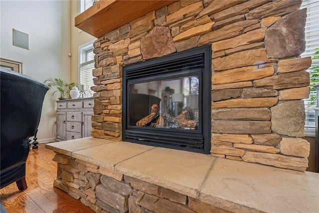 1041 Ashfield Way, Salem Twp Wml, PA 15601 - detailed view of a fireplace and wood finished floors