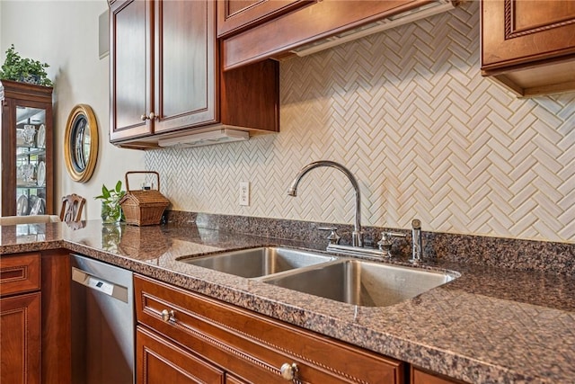 1041 Ashfield Way, Salem Twp Wml, PA 15601 - kitchen with stainless steel dishwasher, tasteful backsplash, dark stone countertops, and brown cabinets