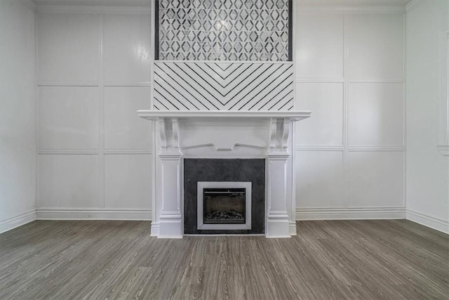 322 S Broadway St, Scottdale, PA 15683 - detailed view of a decorative wall, wood finished floors, and a high end fireplace