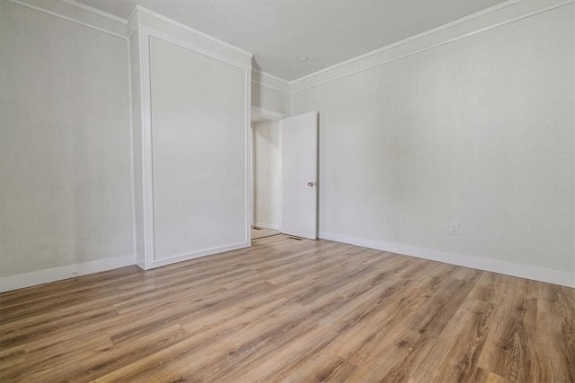 322 S Broadway St, Scottdale, PA 15683 - unfurnished bedroom with ornamental molding and wood finished floors