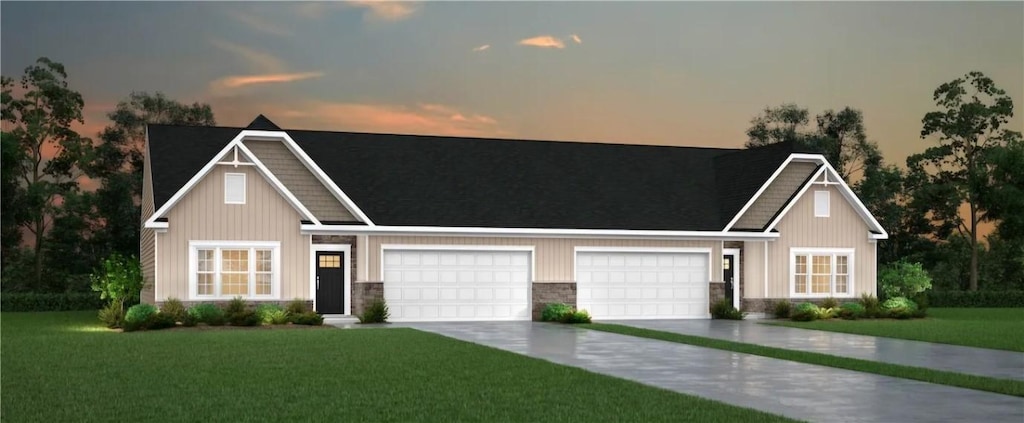 167 Raven Cir Unit 244A, Buffalo Twp But, PA 16055 - craftsman inspired home featuring an attached garage, concrete driveway, a front lawn, and stone siding