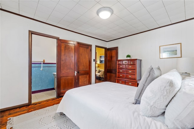 12091/2 Vance Ave, Coraopolis, PA 15108 - bedroom with crown molding, wood finished floors, and connected bathroom