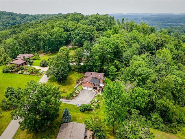 223 Horseshoe Dr, Adams Twp, PA 16046 - aerial view of property and surrounding area featuring a heavily wooded area