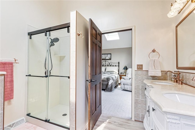223 Horseshoe Dr, Adams Twp, PA 16046 - ensuite bathroom with a stall shower and double vanity