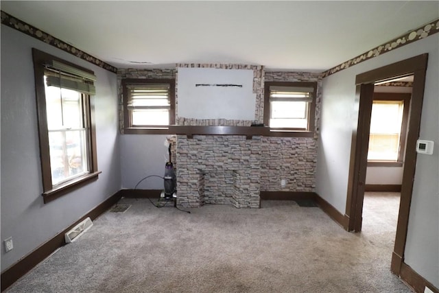 1700 Grall Ave, Shaler, PA 15209 - unfurnished living room featuring healthy amount of natural light and carpet floors