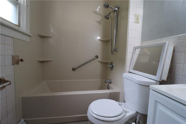 1700 Grall Ave, Shaler, PA 15209 - bathroom with tile walls, vanity, and shower / tub combination