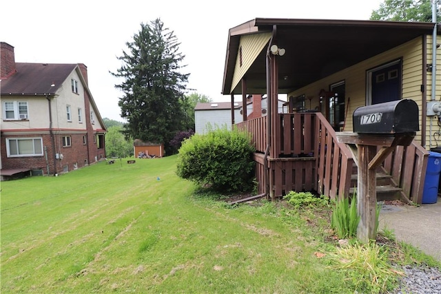 1700 Grall Ave, Shaler, PA 15209 - view of green lawn with covered porch and a carport