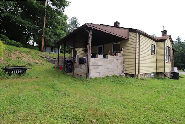 1700 Grall Ave, Shaler, PA 15209 - view of side of property with a chimney and a yard