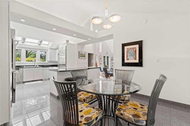 241 W Chapel Ridge Rd, Fox Chapel, PA 15238 - dining room with granite tiled floors, a chandelier, recessed lighting, and high vaulted ceiling
