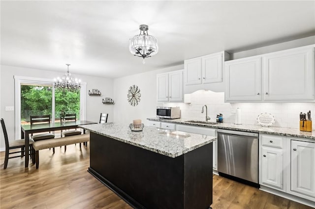 2805 Hamilton Ave, Shaler, PA 15116 - kitchen featuring stainless steel appliances, a chandelier, and backsplash