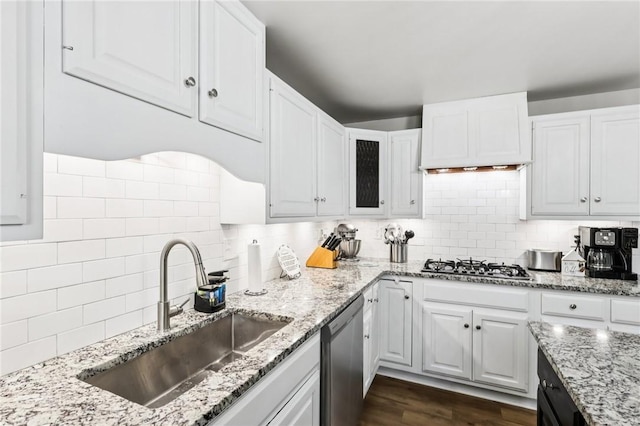 2805 Hamilton Ave, Shaler, PA 15116 - kitchen with stainless steel appliances, white cabinetry, decorative backsplash, light stone counters, and dark wood finished floors