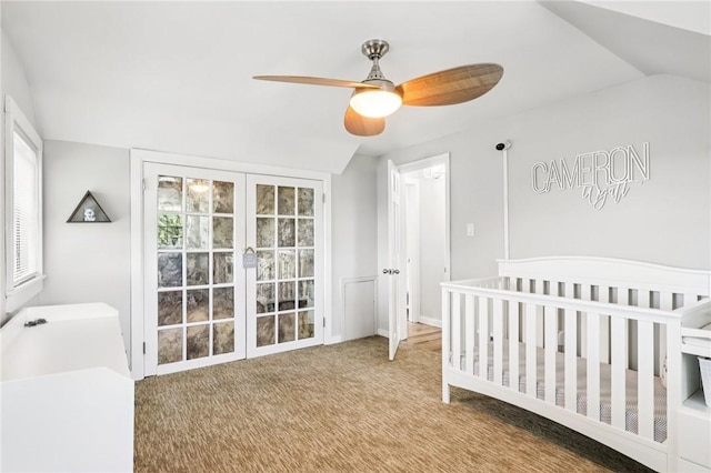 2805 Hamilton Ave, Shaler, PA 15116 - carpeted bedroom with french doors, ceiling fan, a crib, and vaulted ceiling