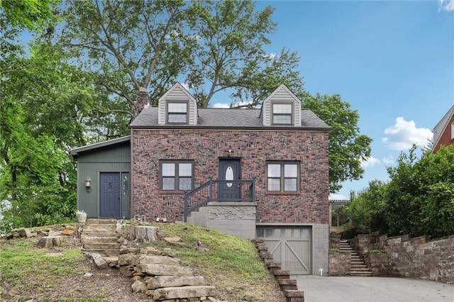 2805 Hamilton Ave, Shaler, PA 15116 - view of front facade with stairway, a garage, concrete driveway, a chimney, and brick siding