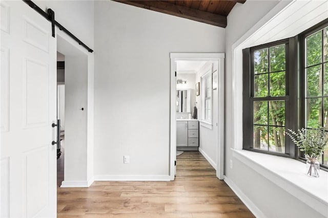 2805 Hamilton Ave, Shaler, PA 15116 - entryway with light wood-style floors, a barn door, and wood ceiling