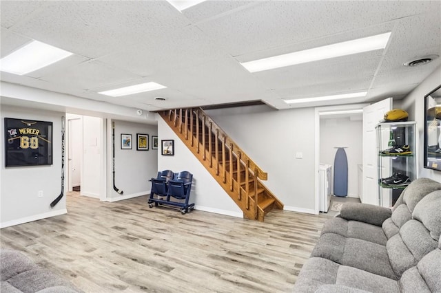 2805 Hamilton Ave, Shaler, PA 15116 - living area featuring wood finished floors, stairs, and a paneled ceiling