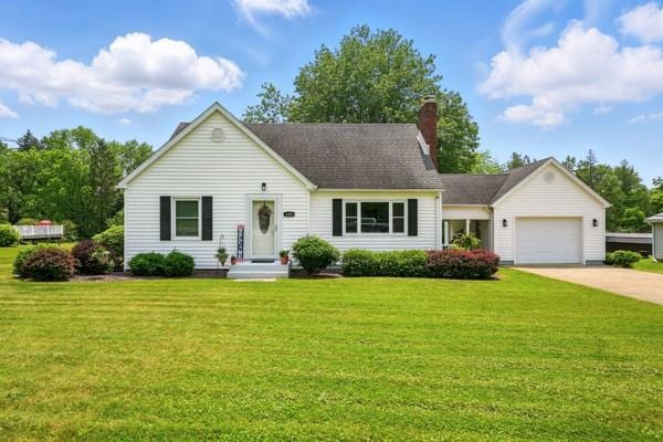 108 E Oakwood Way, Neshannock Twp, PA 16105 - view of front facade featuring an attached garage, a chimney, a front lawn, and concrete driveway