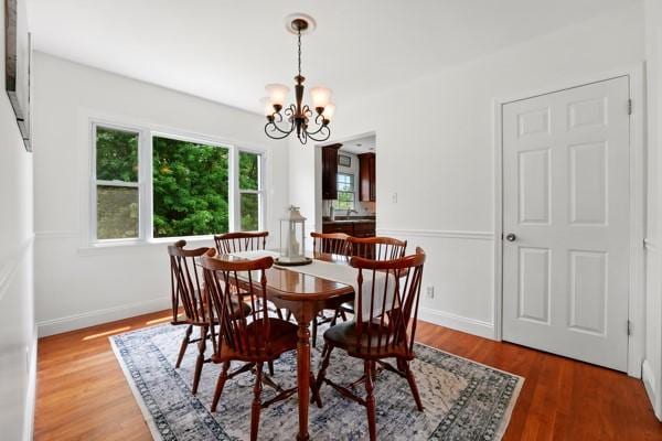 108 E Oakwood Way, Neshannock Twp, PA 16105 - dining area featuring a chandelier and wood finished floors