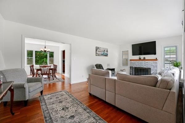 108 E Oakwood Way, Neshannock Twp, PA 16105 - living area featuring a chandelier, dark wood finished floors, and a fireplace