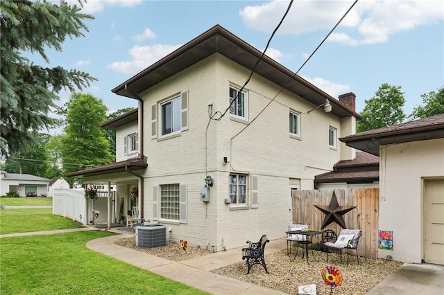 6 Edgewood Acres, Neshannock Twp, PA 16105 - rear view of house with brick siding and a chimney