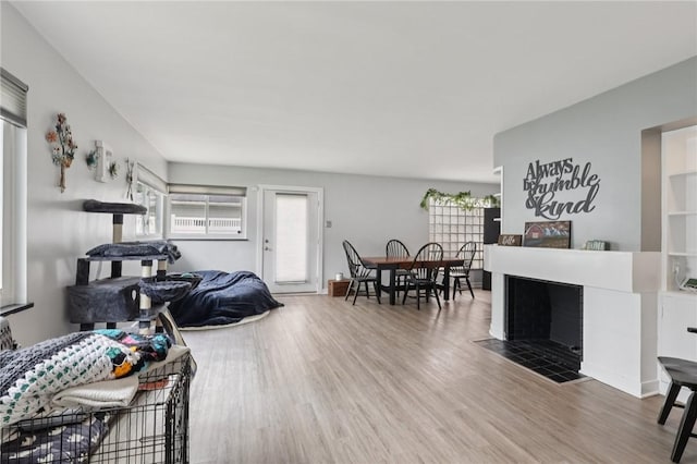 6 Edgewood Acres, Neshannock Twp, PA 16105 - living area with wood finished floors, healthy amount of natural light, and a fireplace with flush hearth