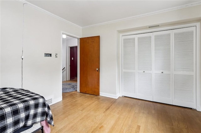 6 Edgewood Acres, Neshannock Twp, PA 16105 - bedroom featuring light wood finished floors, ornamental molding, and a closet