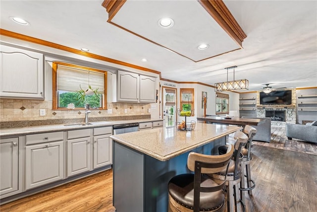 1007 Braemar Dr, Penn Twp Wml, PA 15644 - kitchen featuring plenty of natural light, light wood-style floors, a kitchen island, open floor plan, and recessed lighting