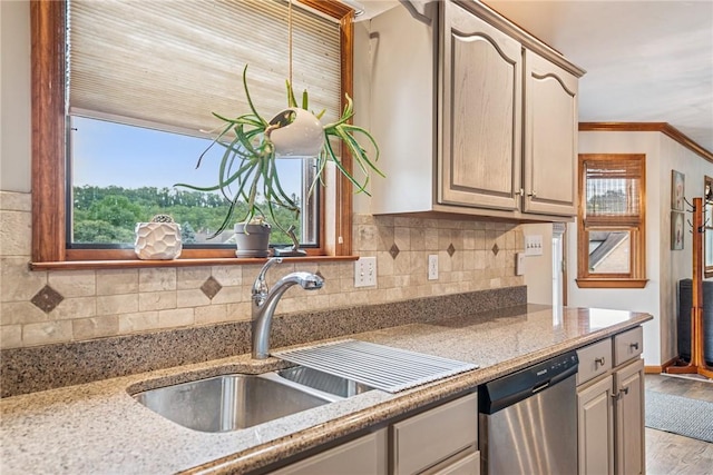 1007 Braemar Dr, Penn Twp Wml, PA 15644 - kitchen featuring dishwasher, light wood-style floors, ornamental molding, tasteful backsplash, and light stone countertops