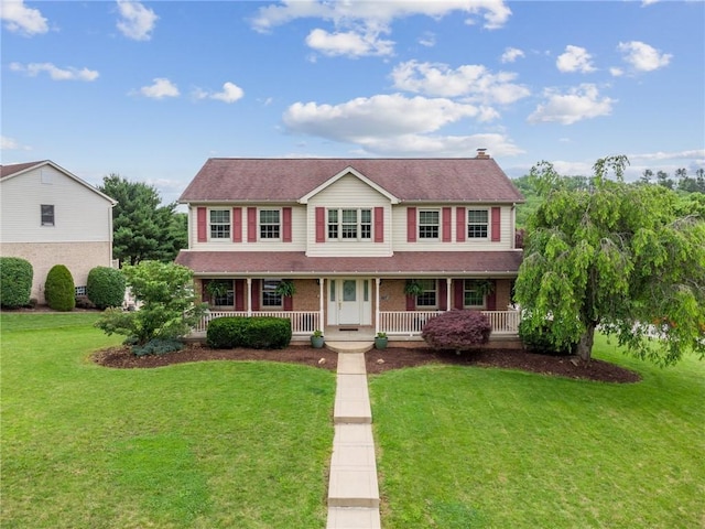 1007 Braemar Dr, Penn Twp Wml, PA 15644 - view of front of property with a porch and a front yard
