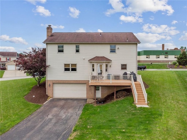 1007 Braemar Dr, Penn Twp Wml, PA 15644 - rear view of property with stairway, a chimney, a wooden deck, asphalt driveway, and an attached garage