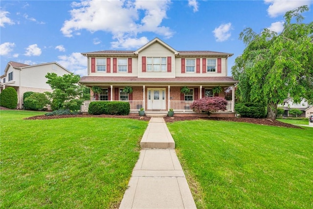 1007 Braemar Dr, Penn Twp Wml, PA 15644 - colonial home with covered porch and a front lawn