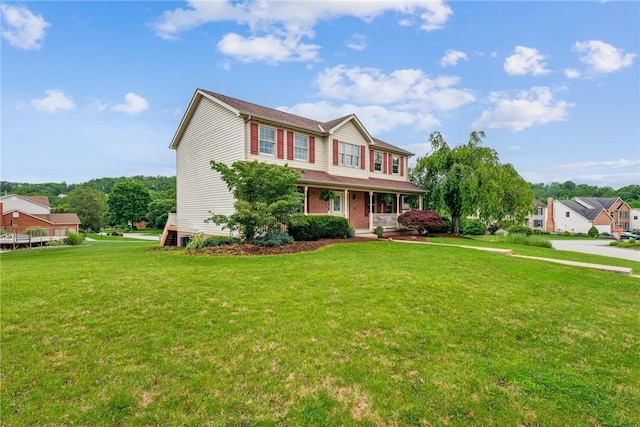 1007 Braemar Dr, Penn Twp Wml, PA 15644 - view of front facade featuring a porch and a front lawn