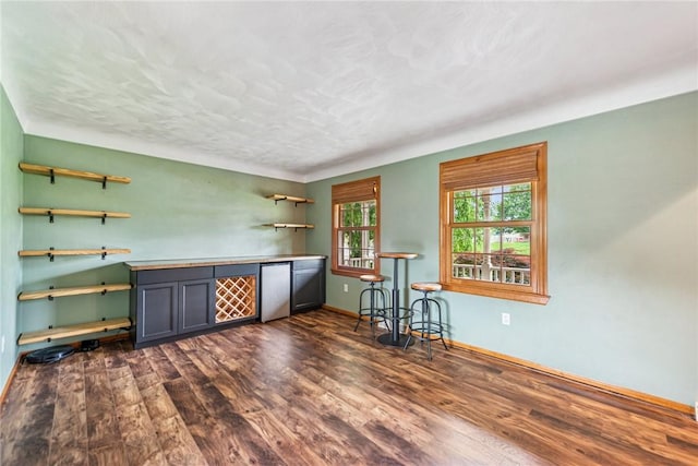 1007 Braemar Dr, Penn Twp Wml, PA 15644 - interior space with a bar and dark wood-type flooring