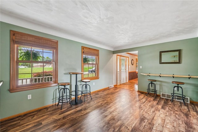 1007 Braemar Dr, Penn Twp Wml, PA 15644 - dining area with wood finished floors and a textured ceiling
