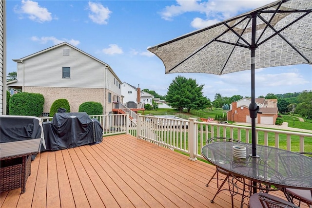 1007 Braemar Dr, Penn Twp Wml, PA 15644 - deck featuring a grill, a yard, and outdoor dining space
