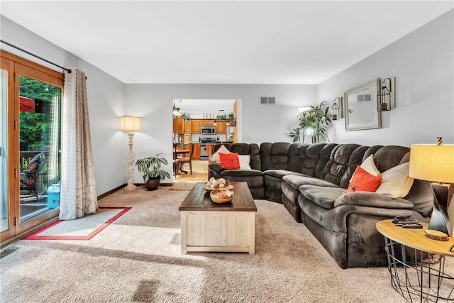 139 Village Dr, Cranberry Twp, PA 16066 - living area featuring carpet flooring and baseboards
