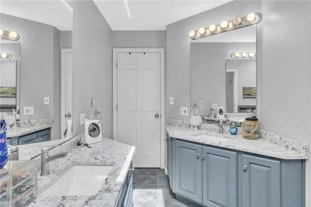139 Village Dr, Cranberry Twp, PA 16066 - bathroom featuring two vanities and tile patterned floors