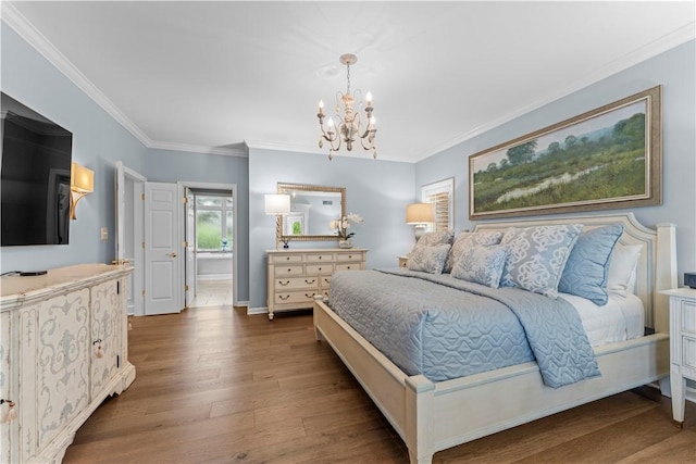 1055 Saint Mellion Dr, Collier Twp, PA 15142 - bedroom with a chandelier, ornamental molding, wood finished floors, and ensuite bath